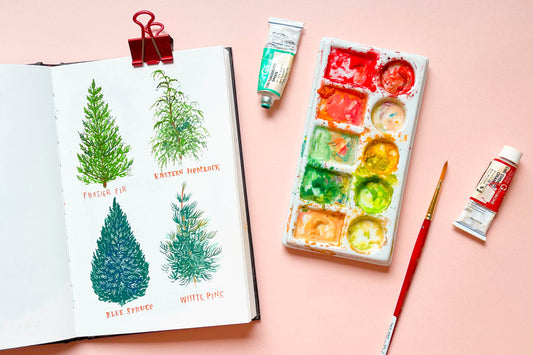 Christmas tree paintings in sketchbook