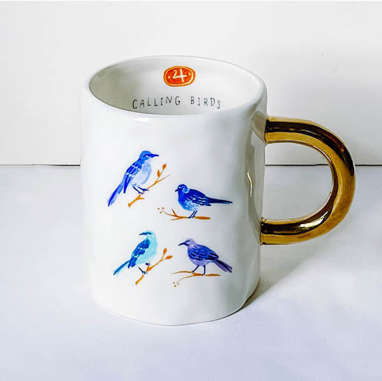 White ceramic mug with 12 days of Christmas