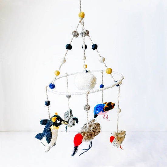 Children's felt mobile with birds and pompoms