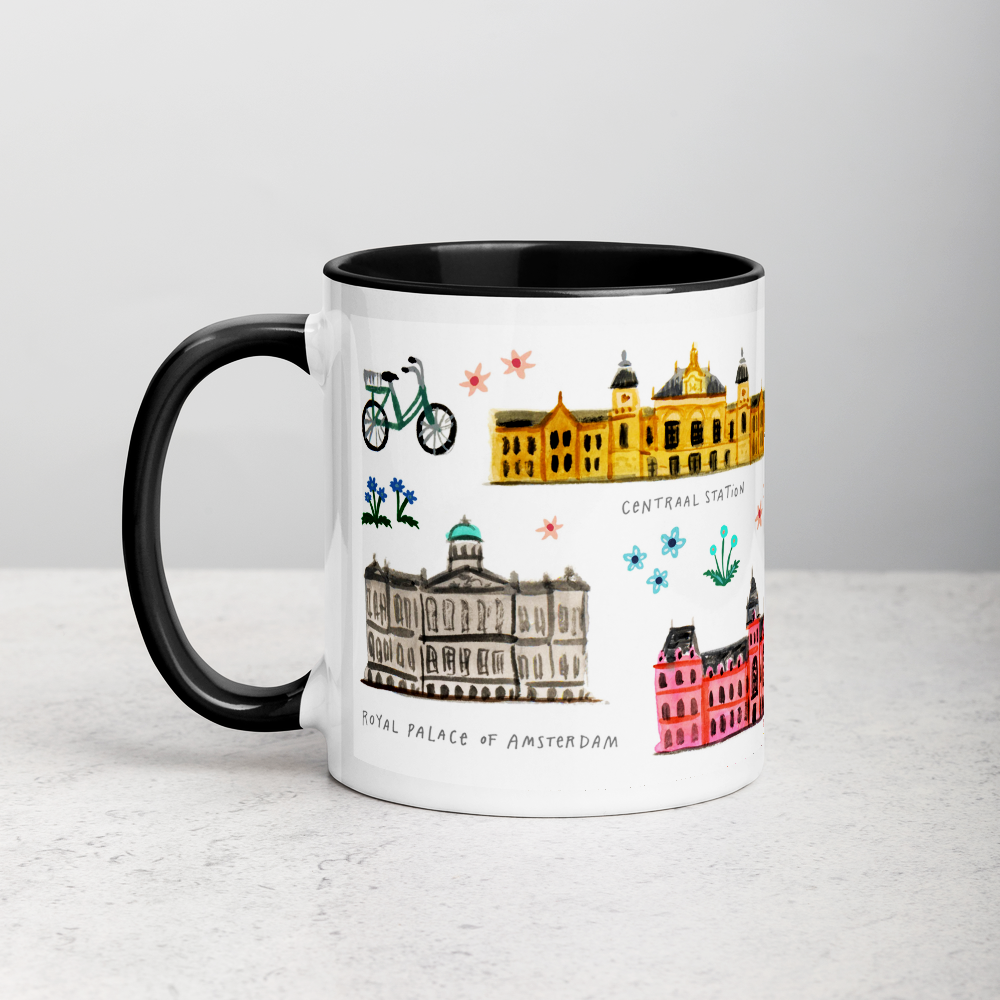 White ceramic coffee mug with black handle and inside; has Amsterdam illustration by Angela Staehling
