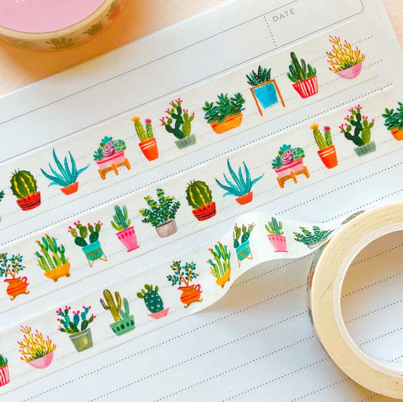 Three rows of Cactus + Succulent Washi Tape on notebook