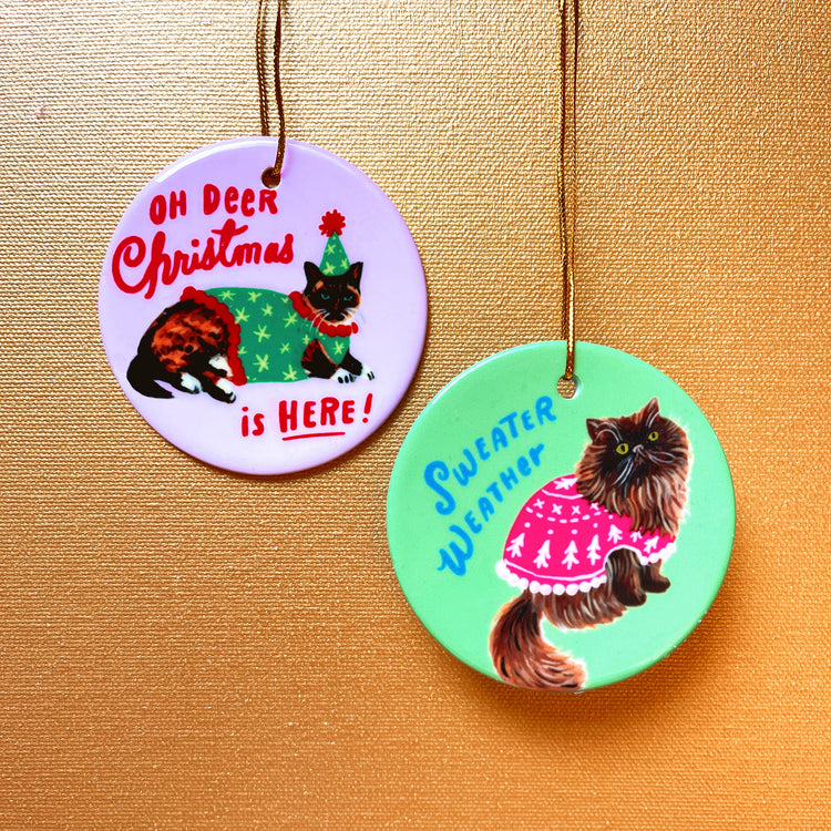 Brown Persian Christmas cat ornament in Holiday sweater