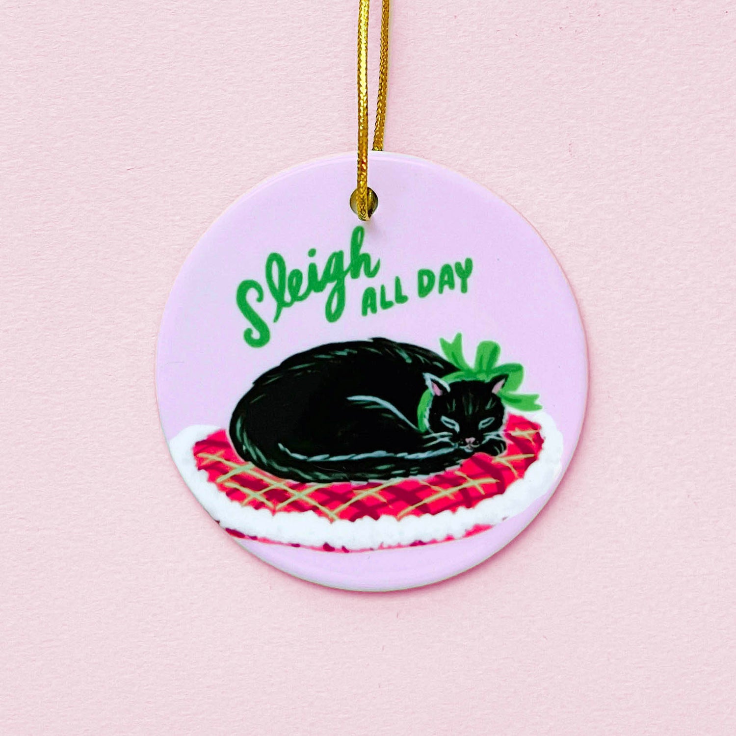 Black cat porcelain Christmas ornament wearing Christmas ribbon
