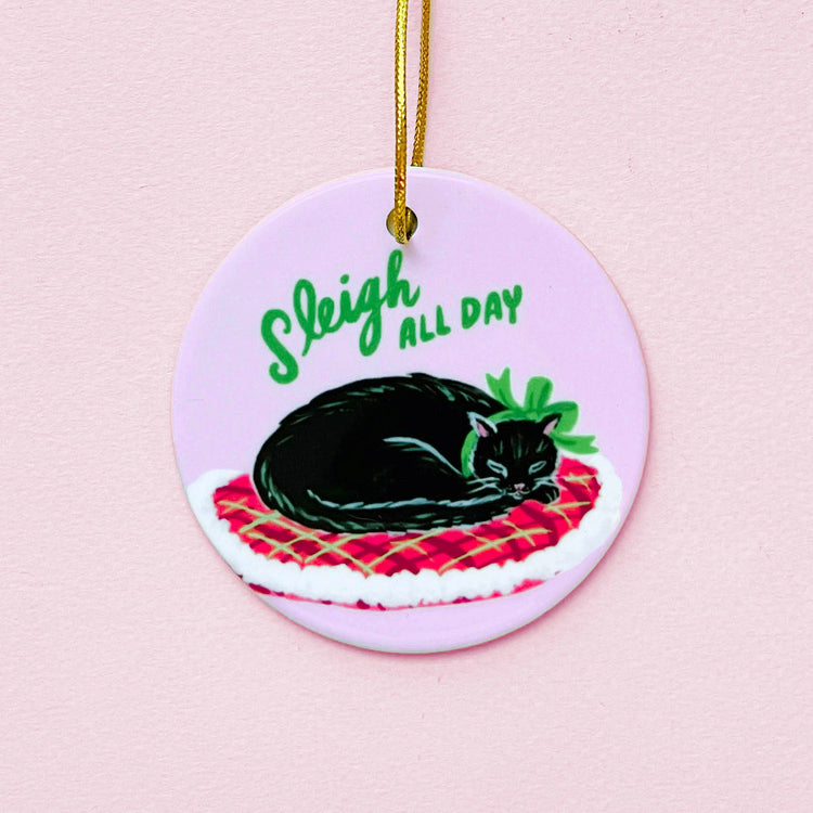 Black cat porcelain Christmas ornament wearing Christmas ribbon