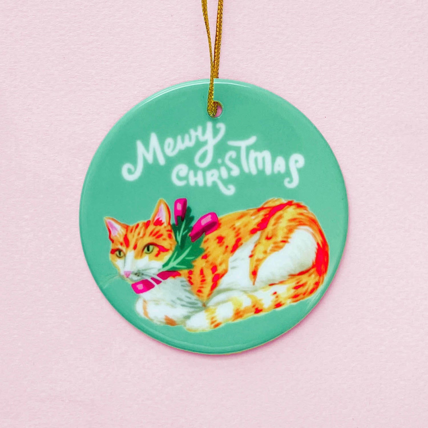 Orange cat Christmas ornament with holiday ribbon