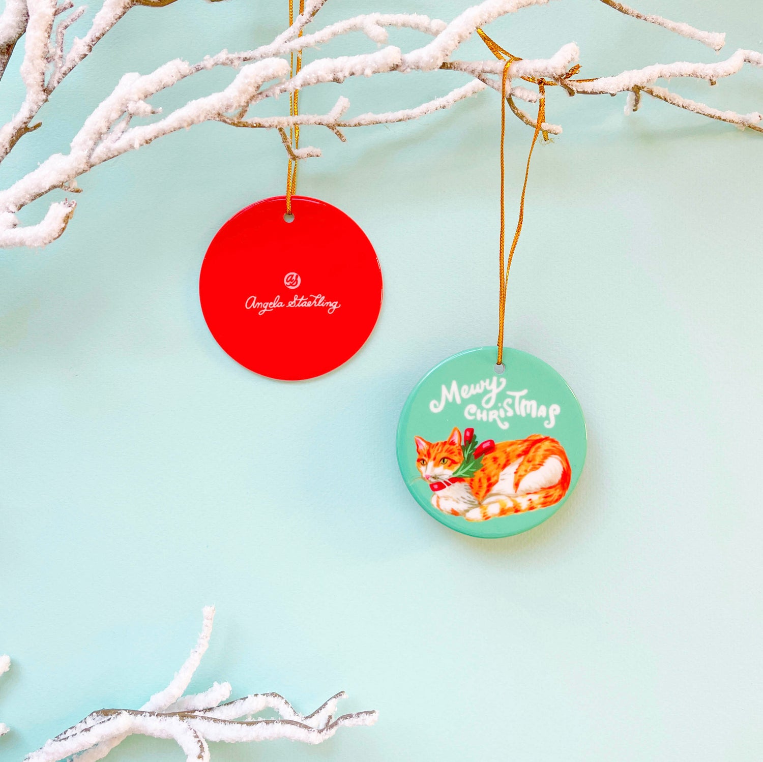 Orange cat Christmas ornament with holiday ribbon