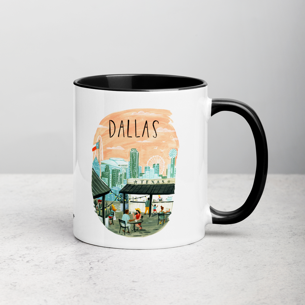 White ceramic coffee mug with black handle and inside; has Dallas Texas illustration by Angela Staehling