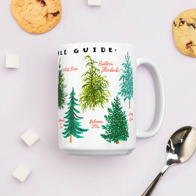 Christmas tree varieties on white ceramic coffee mug