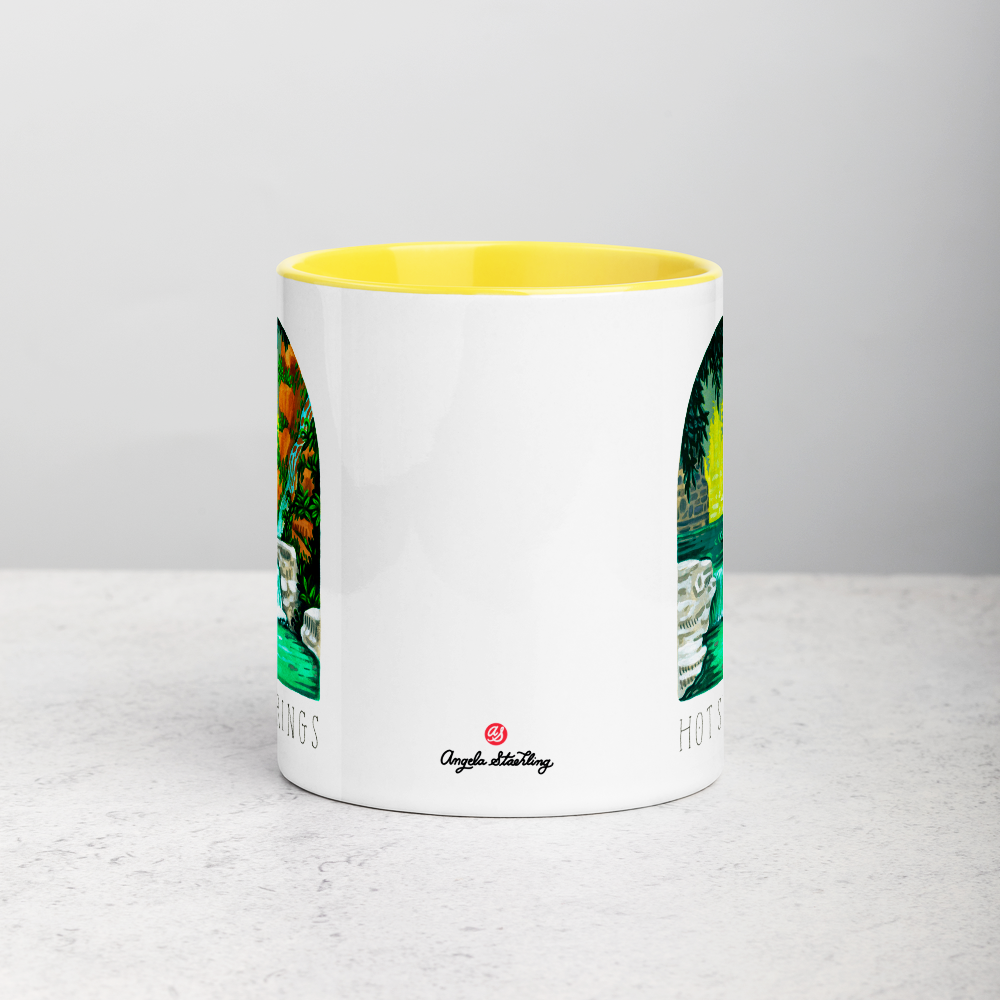 White ceramic coffee mug with yellow handle and inside; has Hot Springs National Park illustration by Angela Staehling