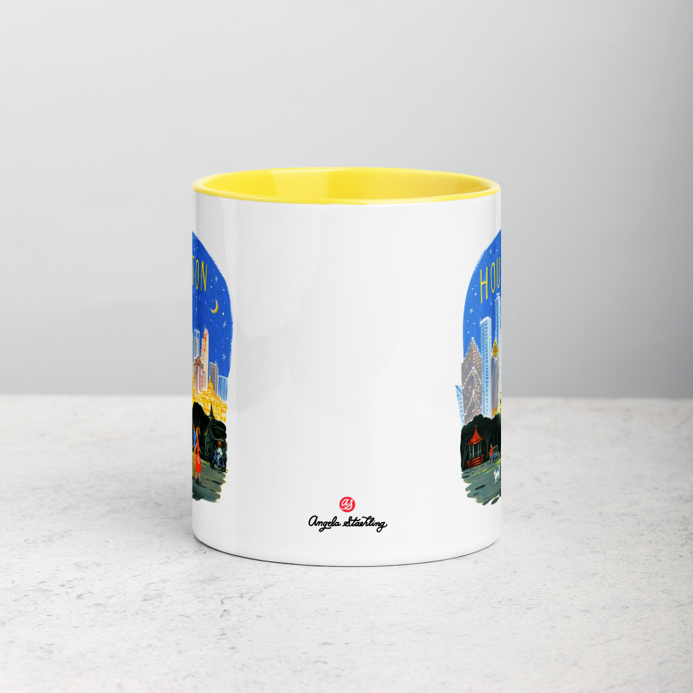 White ceramic coffee mug with yellow handle and inside; has Houston Texas illustration by Angela Staehling