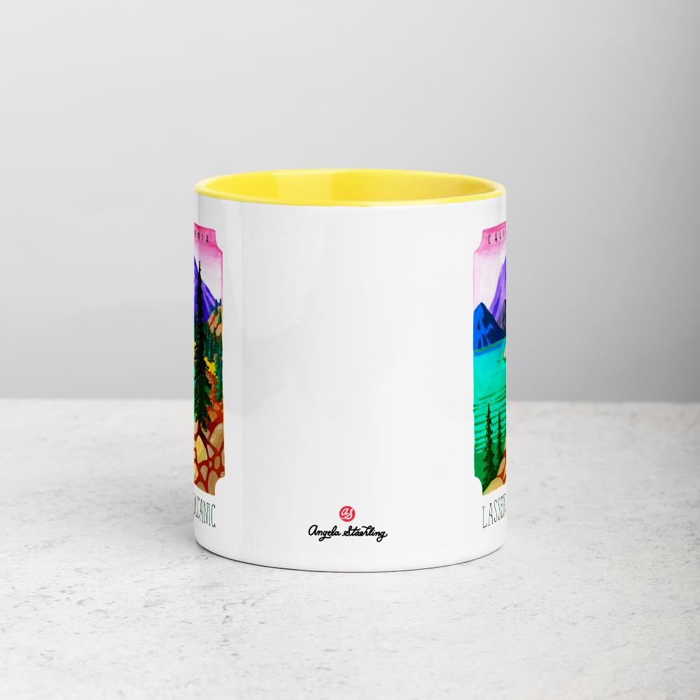 White ceramic coffee mug with yellow handle and inside; has Lassen Volcanic National Park illustration by Angela Staehling