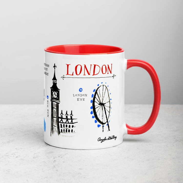 White ceramic coffee mug with red handle and inside; has London landmarks illustration by Angela Staehling
