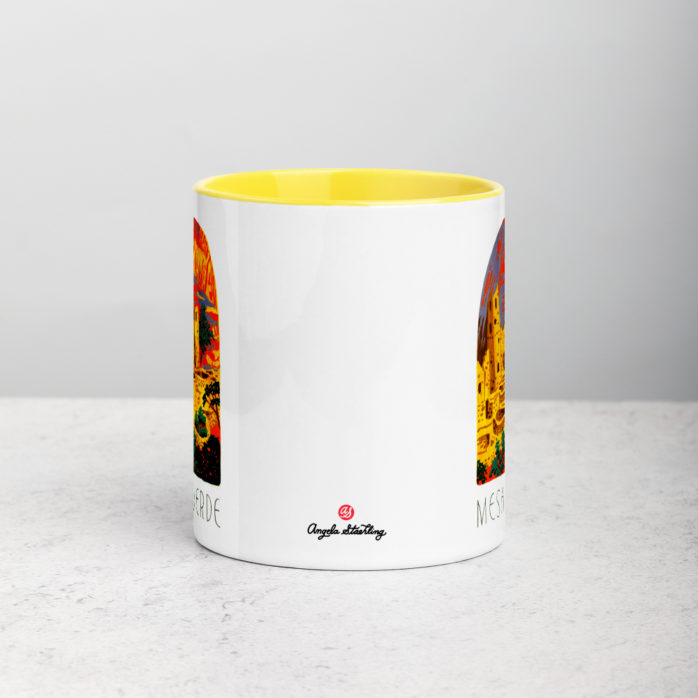 White ceramic coffee mug with yellow handle and inside; has Mesa Verde National Park illustration by Angela Staehling