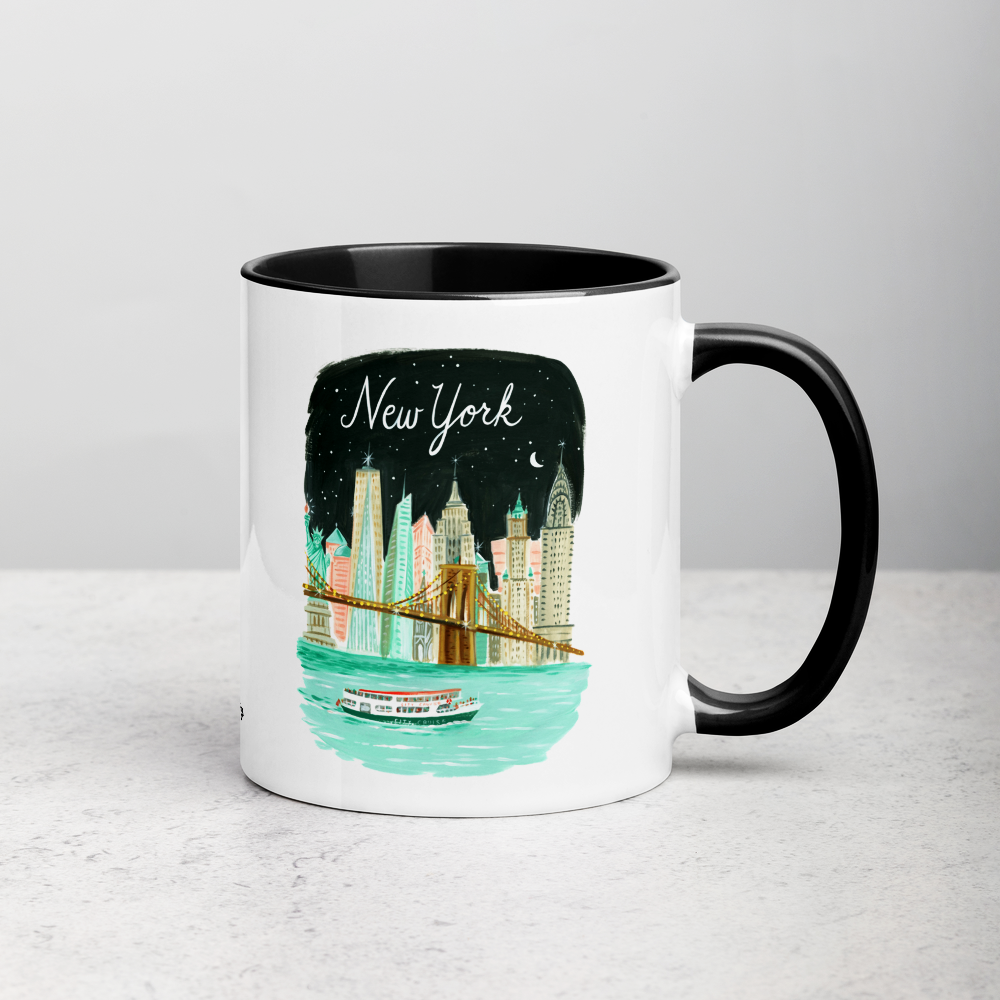 White ceramic coffee mug with black handle and inside; has New York City Skyline illustration by Angela Staehling