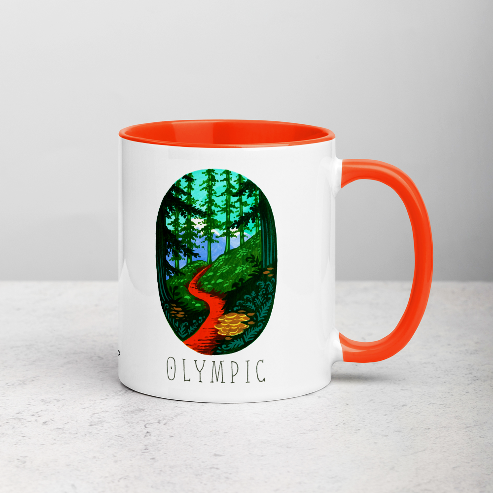White ceramic coffee mug with orange handle and inside; has Olympic National Park illustration by Angela Staehling