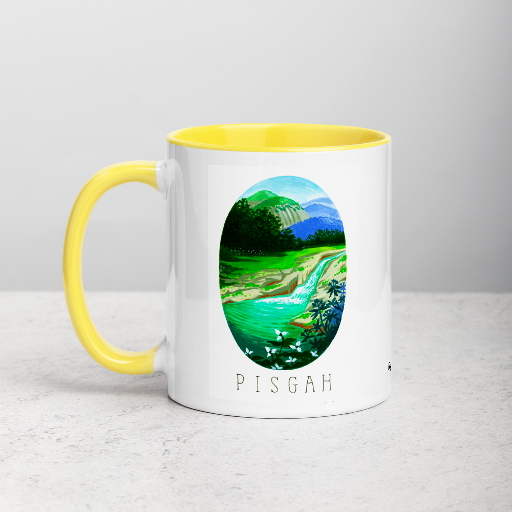 White ceramic coffee mug with yellow handle and inside; has Pisgah National Park illustration by Angela Staehling