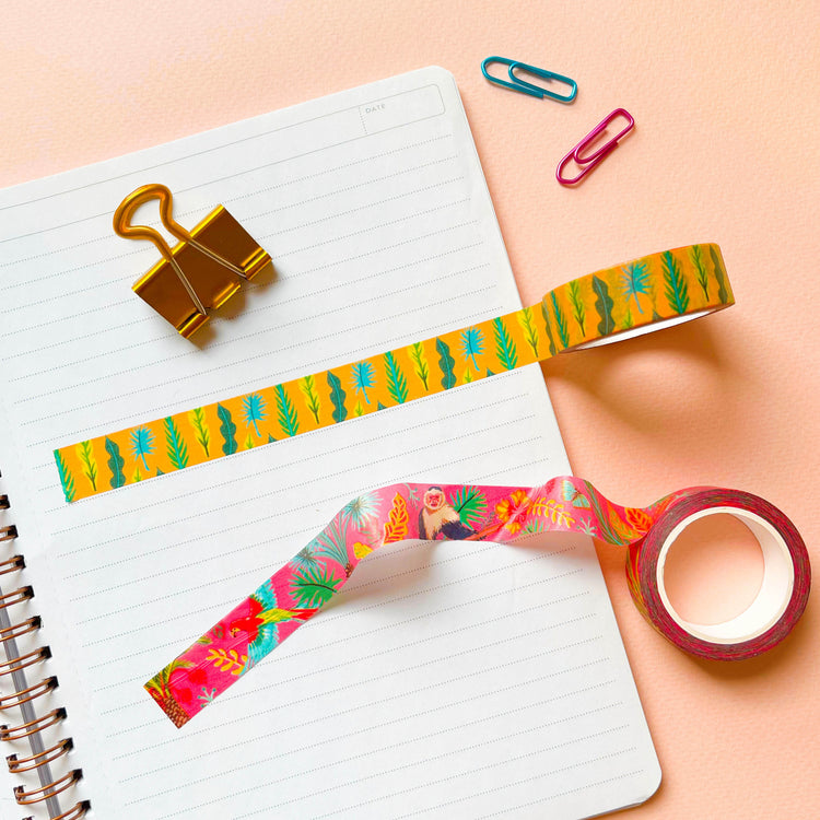 Two rolls of tropical yellow and red washi tale with paperclips