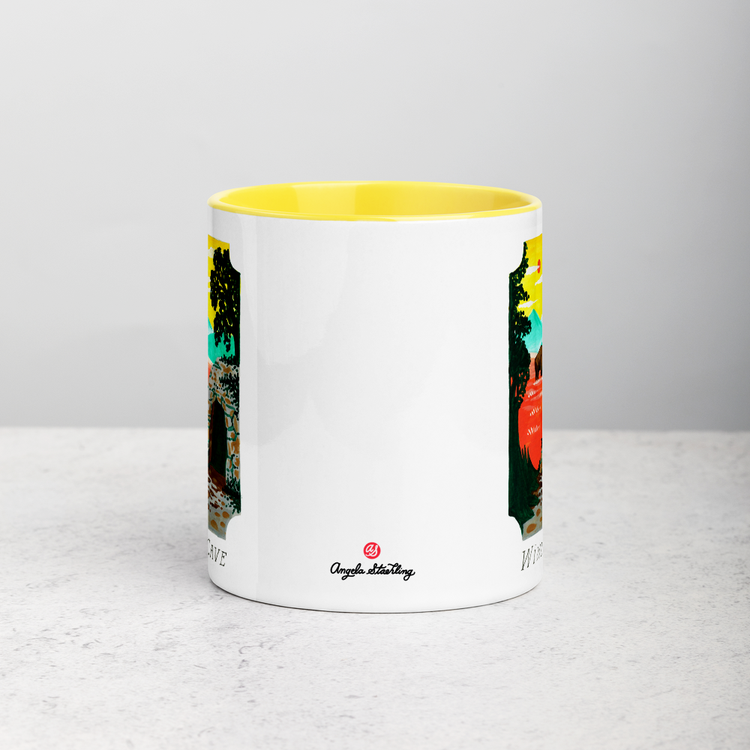 White ceramic coffee mug with yellow handle and inside; has Wind Cave National Park illustration by Angela Staehling
