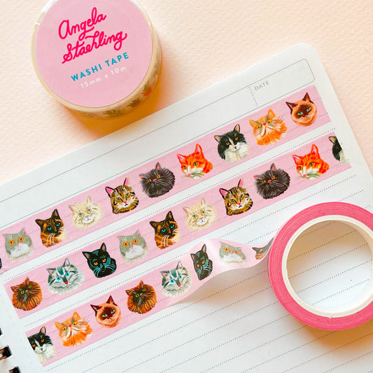 Cat washi tape on pink background.