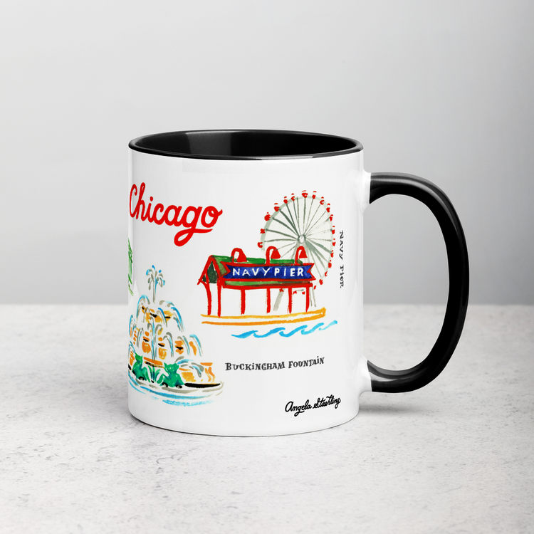 White ceramic coffee mug with black handle and inside; has Chicago landmarks illustration by Angela Staehling