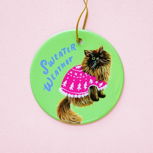 Brown Persian Christmas cat ornament in Holiday sweater
