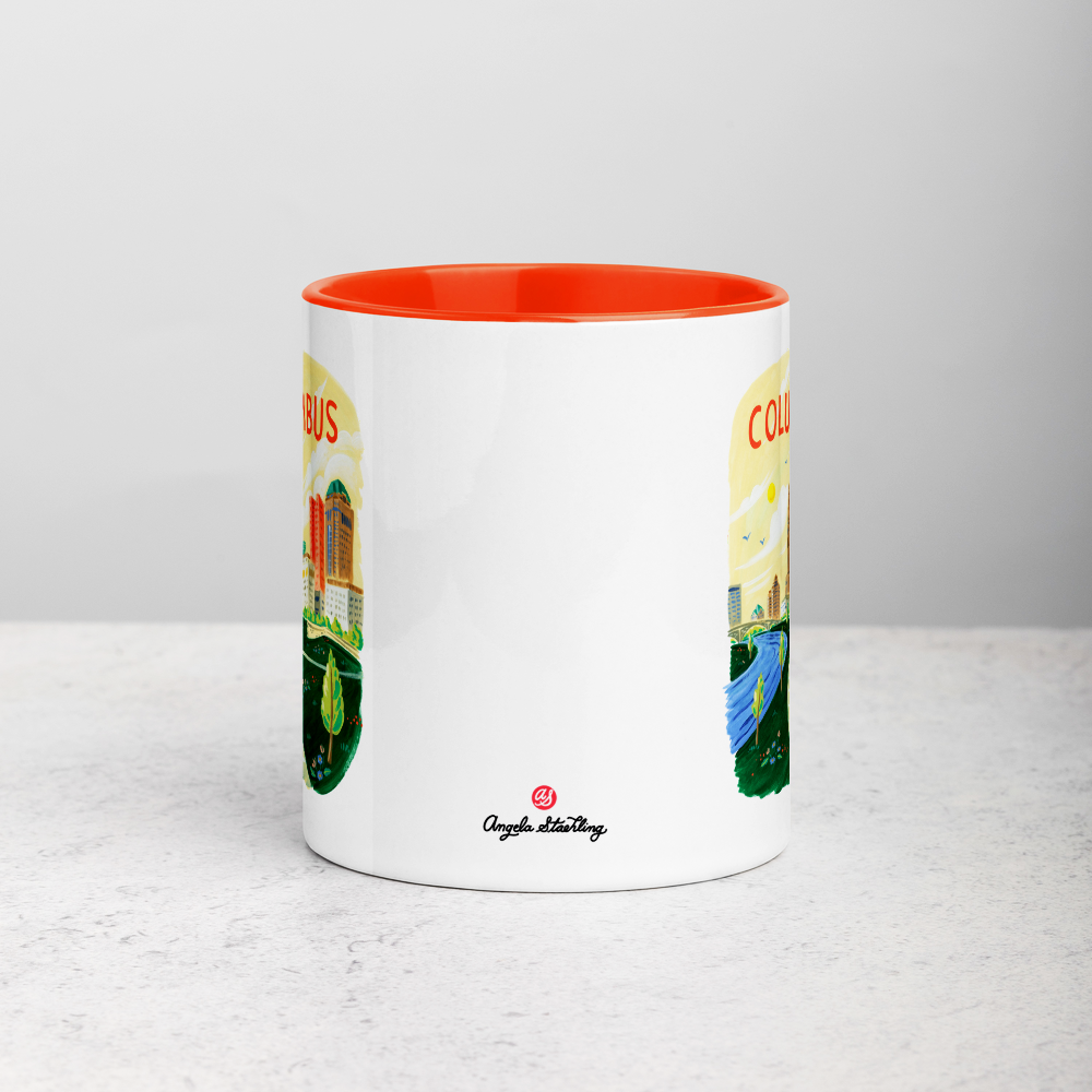 White ceramic coffee mug with orange handle and inside; has Columbus Ohio illustration by Angela Staehling