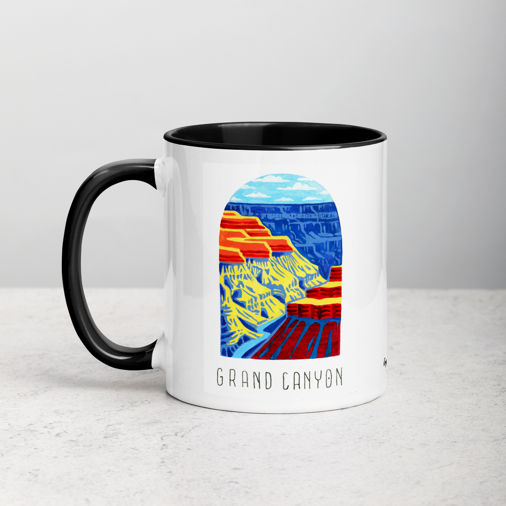 White ceramic coffee mug with black handle and inside; has Grand Canyon National Park illustration by Angela Staehling