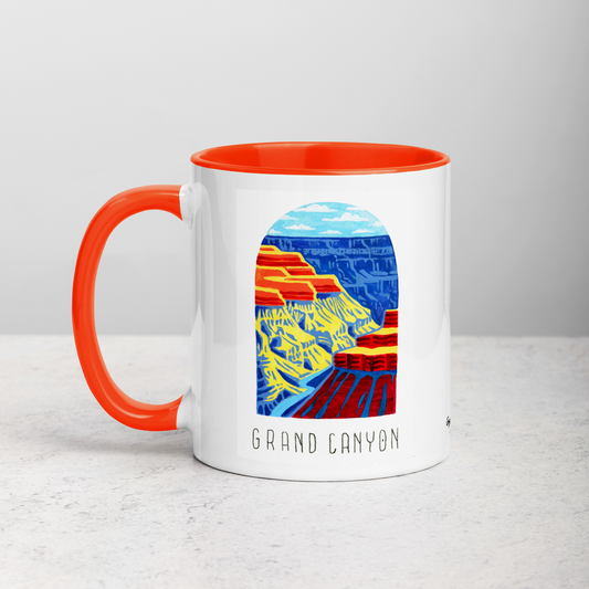 White ceramic coffee mug with orange handle and inside; has Grand Canyon National Park illustration by Angela Staehling