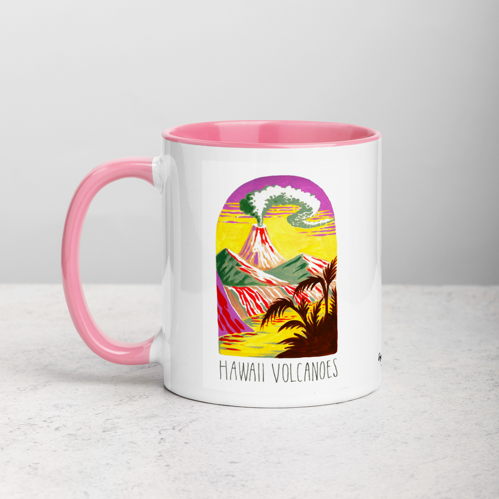White ceramic coffee mug with pink handle and inside; has Hawaii Volcanoes National Park illustration by Angela Staehling