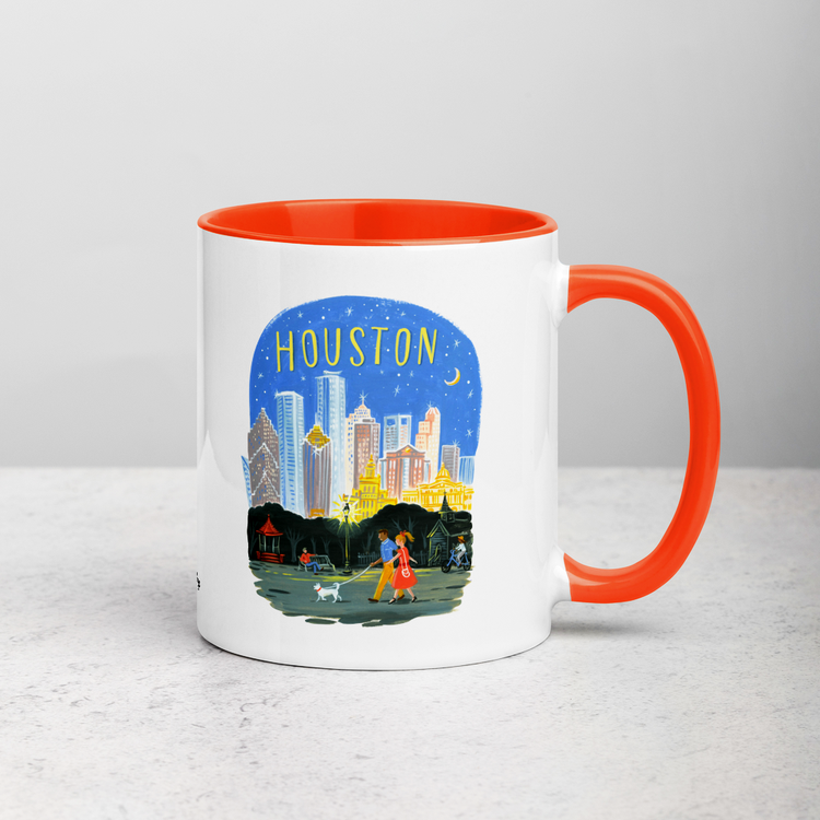 White ceramic coffee mug with orange handle and inside; has Houston Texas illustration by Angela Staehling