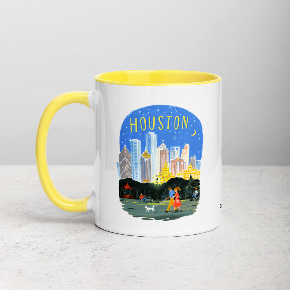 White ceramic coffee mug with yellow handle and inside; has Houston Texas illustration by Angela Staehling