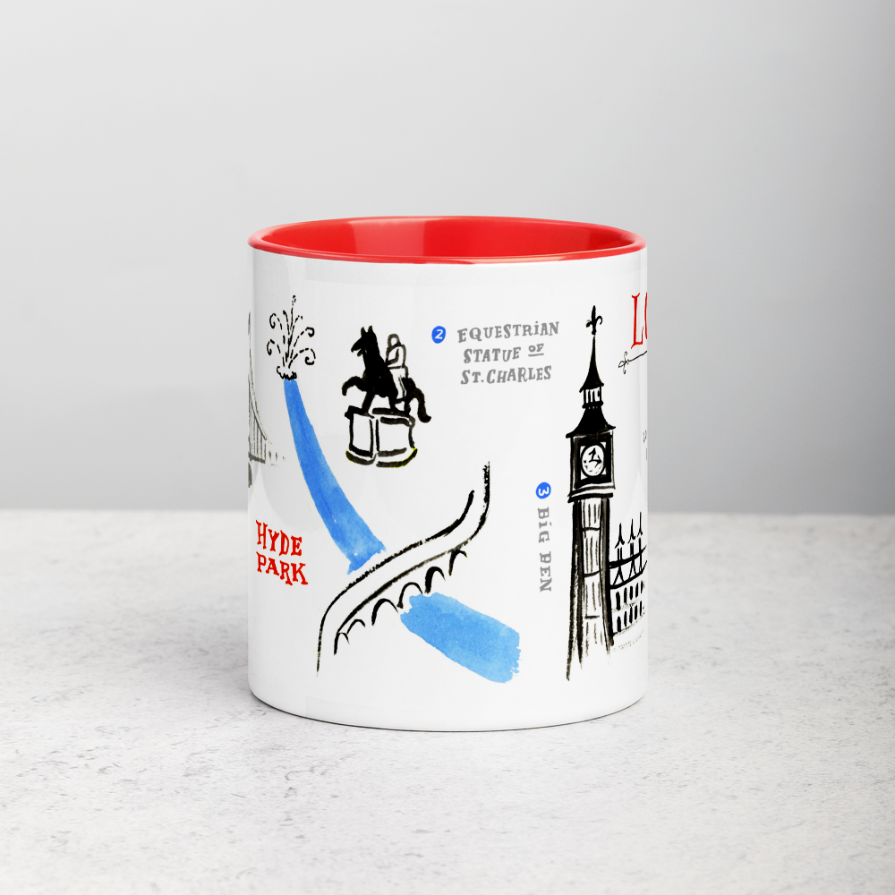 White ceramic coffee mug with red handle and inside; has London landmarks illustration by Angela Staehling