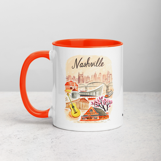 White ceramic coffee mug with orange handle and inside; has Nashville Tennessee illustration by Angela Staehling