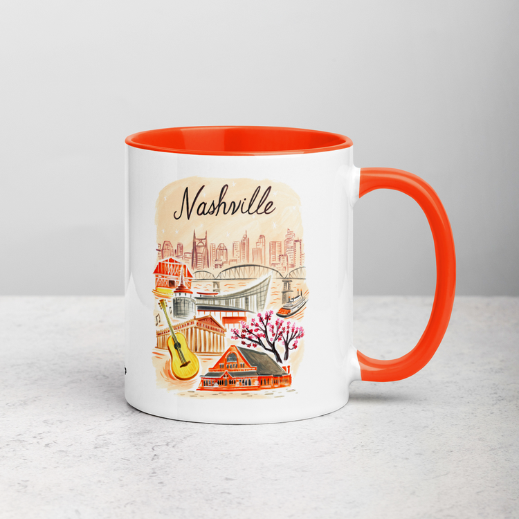 White ceramic coffee mug with orange handle and inside; has Nashville Tennessee illustration by Angela Staehling