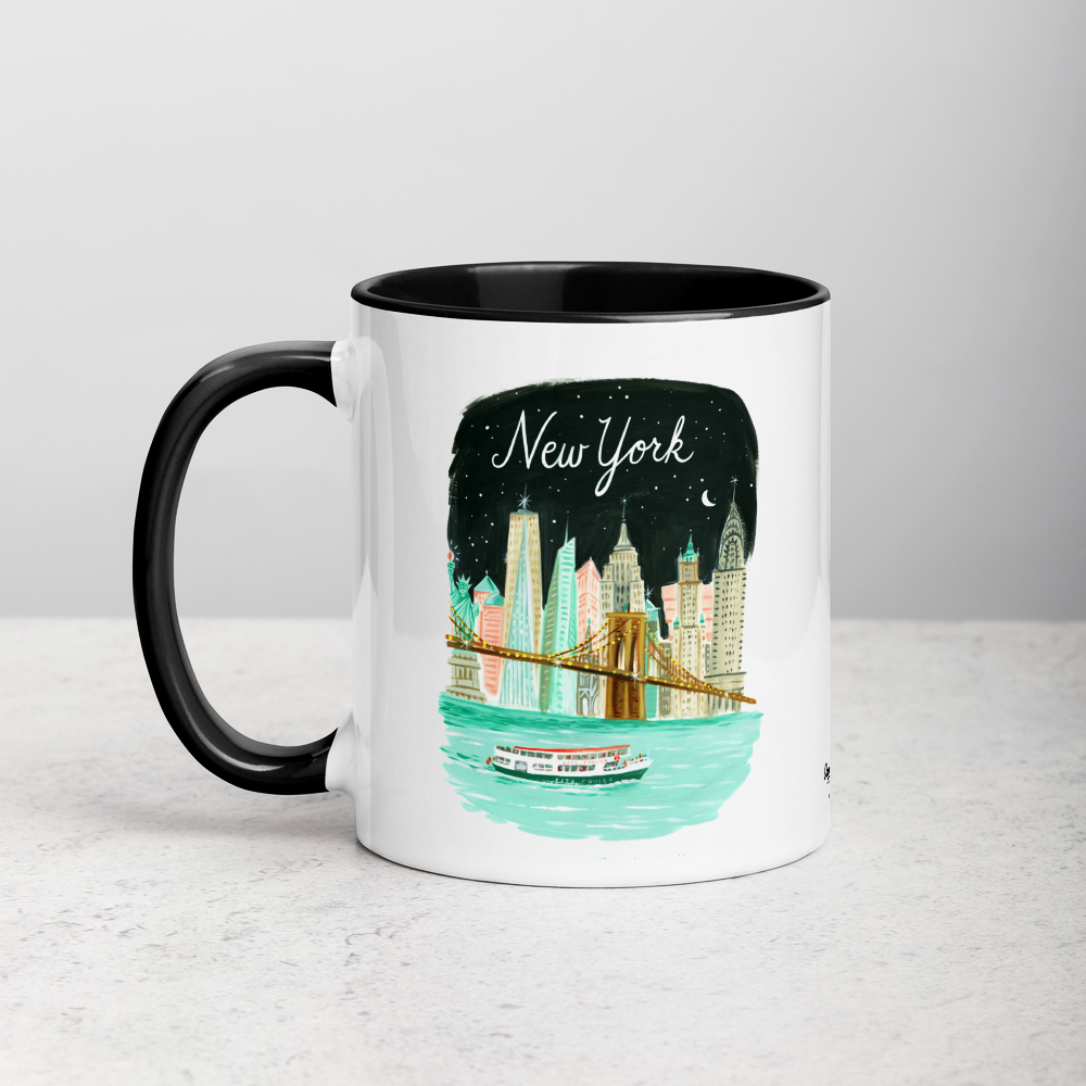 White ceramic coffee mug with black handle and inside; has New York City Skyline illustration by Angela Staehling