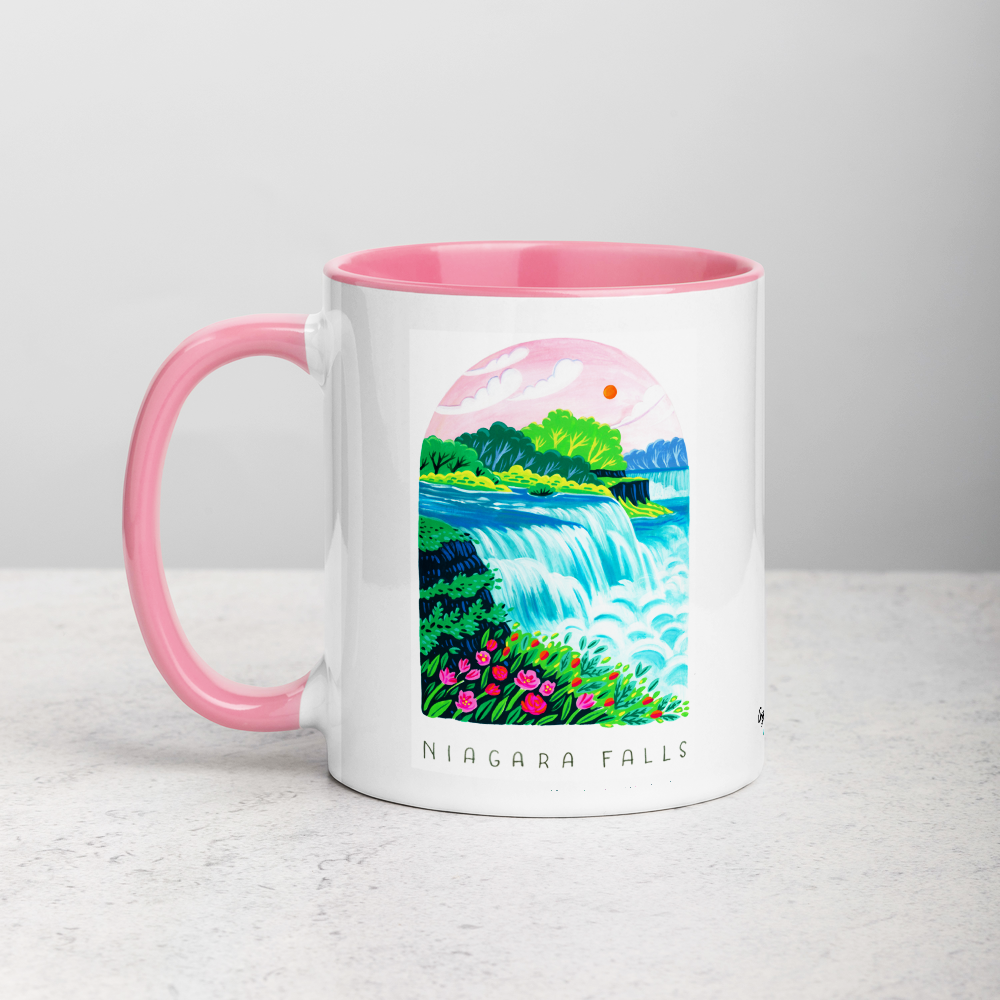 White ceramic coffee mug with pink handle and inside; has Niagara Falls National Park illustration by Angela Staehling