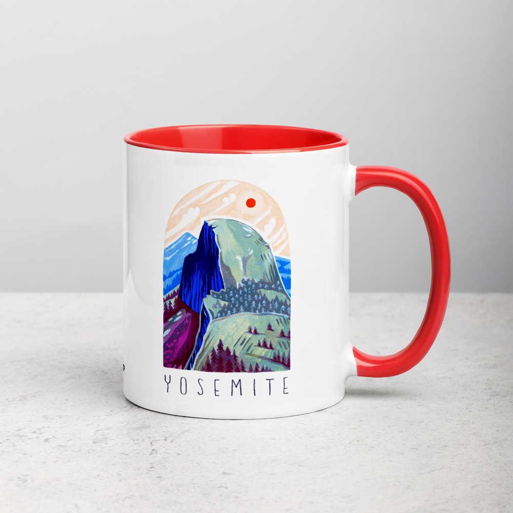 White ceramic coffee mug with red handle and inside; has Yosemite National Park illustration by Angela Staehling